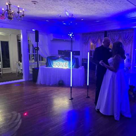 DJ Betty and Barney sharing a dance at a wedding